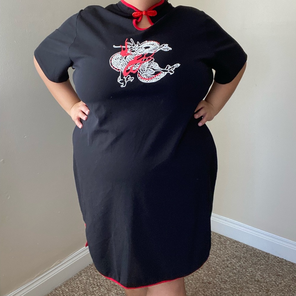 Black dress with dragon design